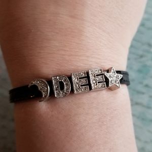 Dee name bracelet moon star silver tone black strap buckle